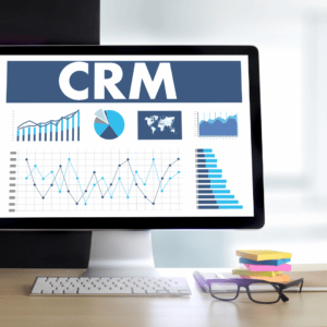 a desktop showing CRM text, graph, and figures possibly for pricing packages