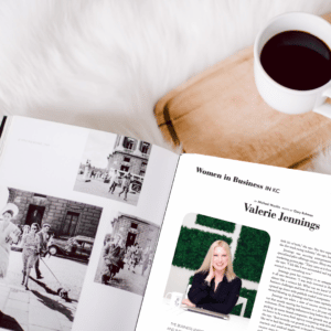 a cup of coffee and a magazine featuring Valerie Jennings